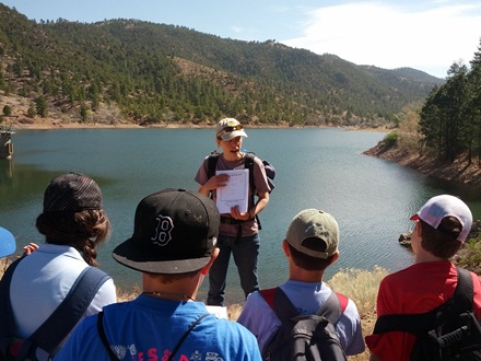 Eileen teaching students near Santa Fe. Photo courtesy of Santa Fe Watershed Association.